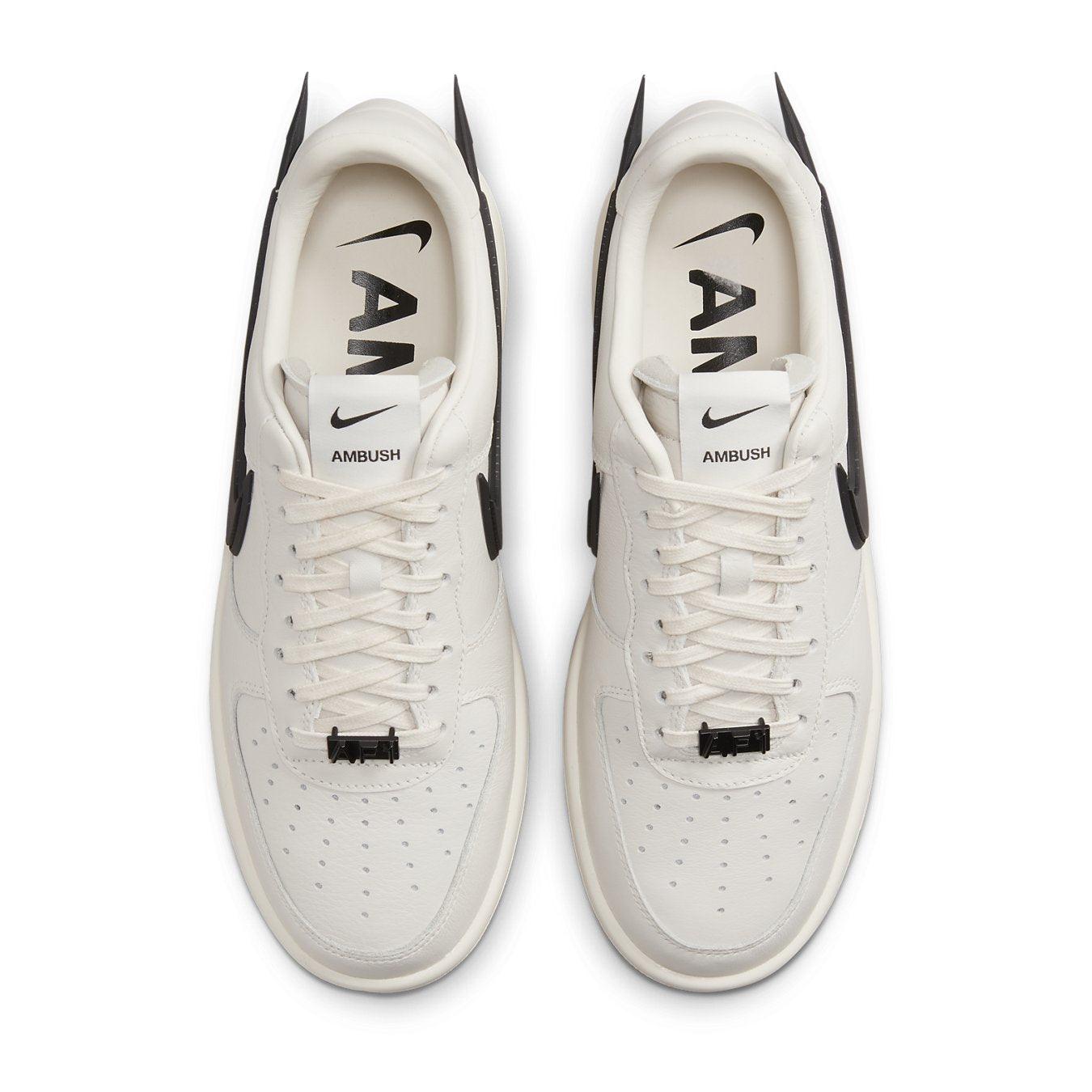 Nike Air Force 1 Low SP AMBUSH Phantom sneakers with unique design and AMBUSH branding in white and black.