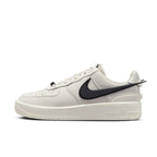 Nike Air Force 1 Low SP AMBUSH Phantom sneaker in light grey with black Swoosh logo.