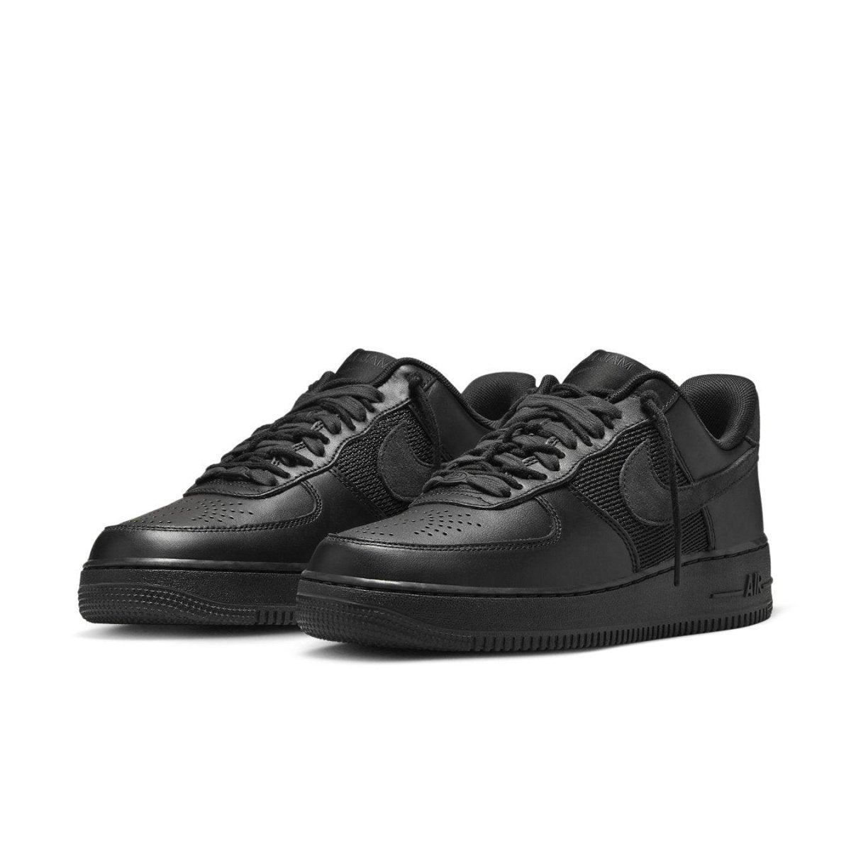 Nike Air Force 1 Low SP Slam Jam in black with mesh panel and unique lacing design, perfect for street style.