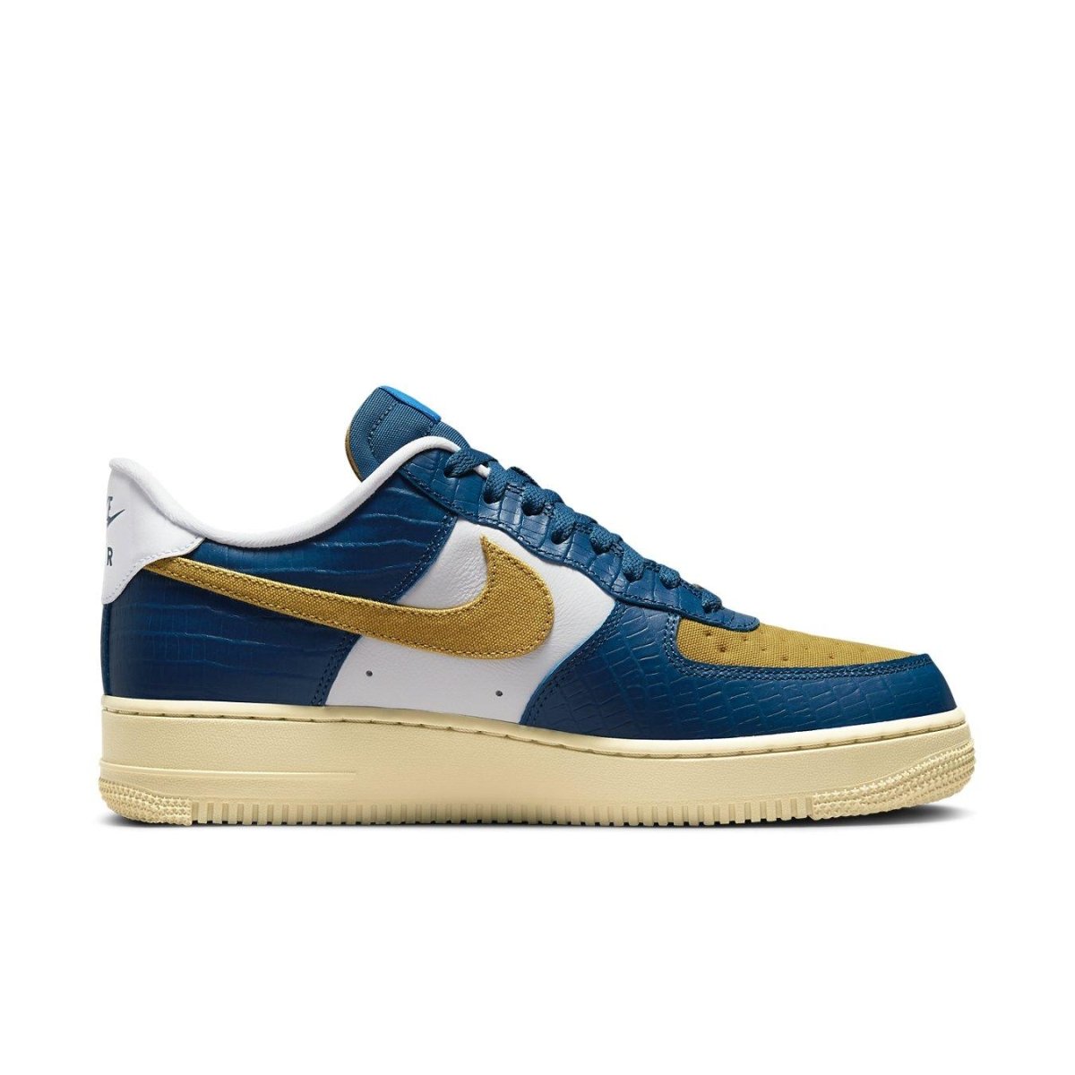 Nike Air Force 1 Low SP Undefeated in blue and yellow croc, featuring premium suede and smooth leather.