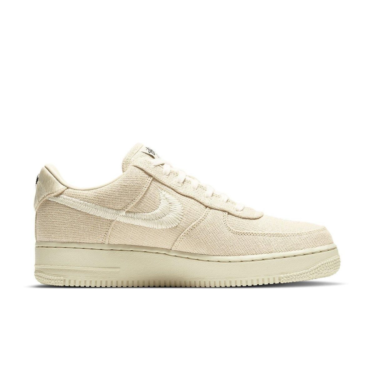 Nike Air Force 1 Low Stussy Fossil in durable hemp, featuring a tonal fossil colorway, side view.