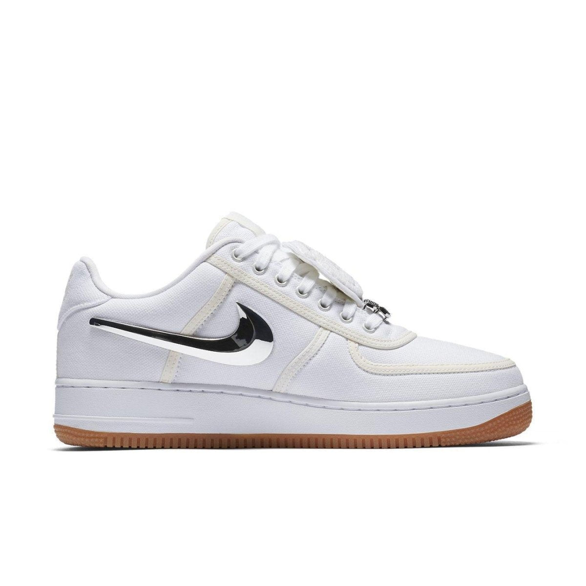 Nike Air Force 1 Low Travis Scott, white sneakers with black swoosh and gum sole, part of AF100 collection.