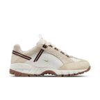 Nike Air Humara LX Jacquemus in light bone and gold with premium suede and leather details.