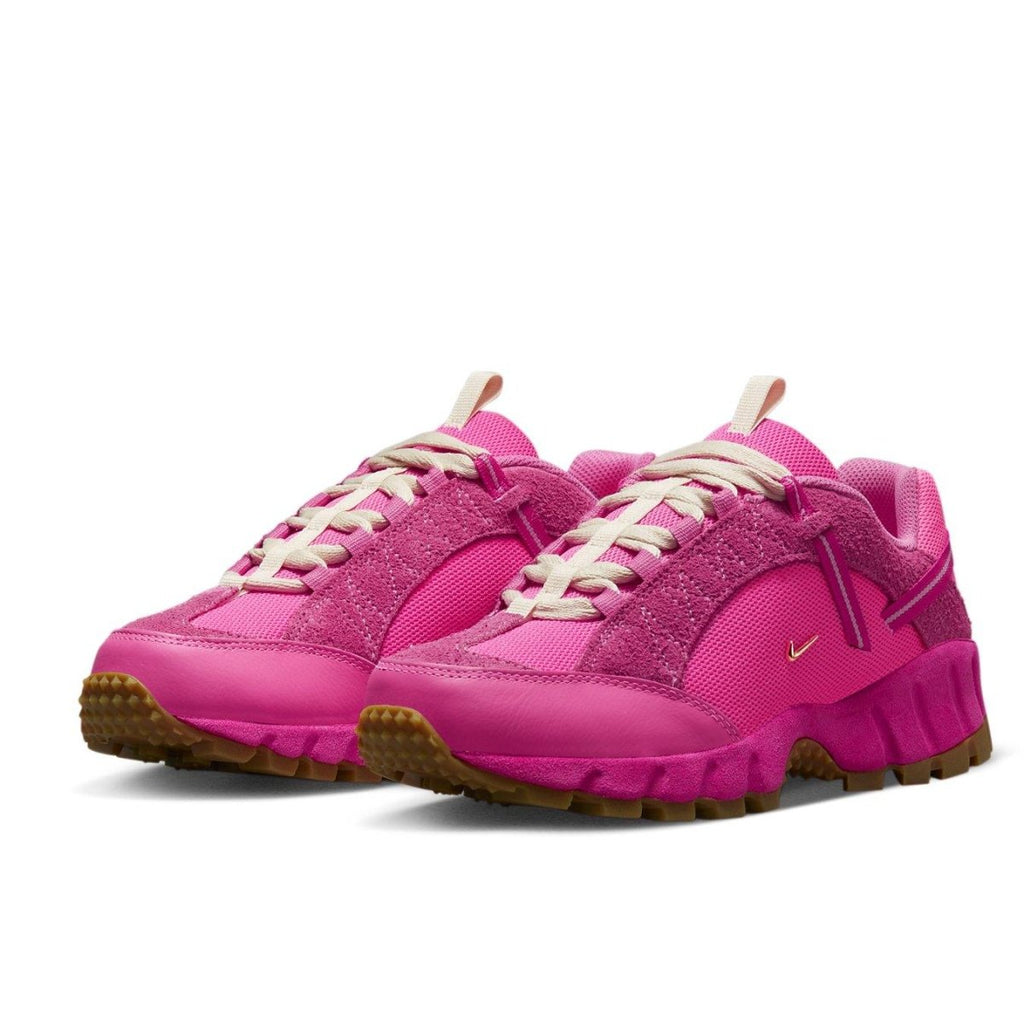 Nike Air Humara LX Jacquemus in Pink Flash for women, featuring suede and mesh materials with gold accents.