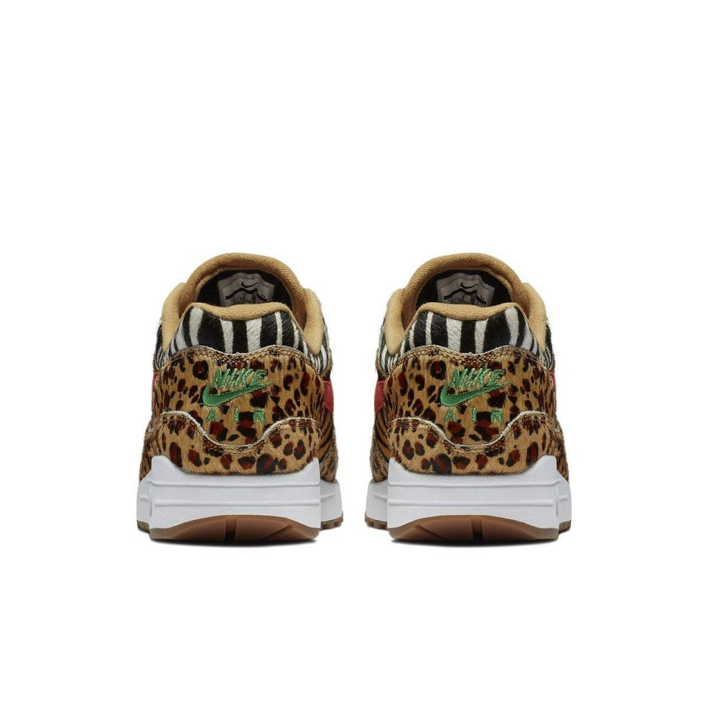 Nike Air Max 1 Atmos Animal Pack 2.0 shoes featuring leopard and zebra patterns from the back view.