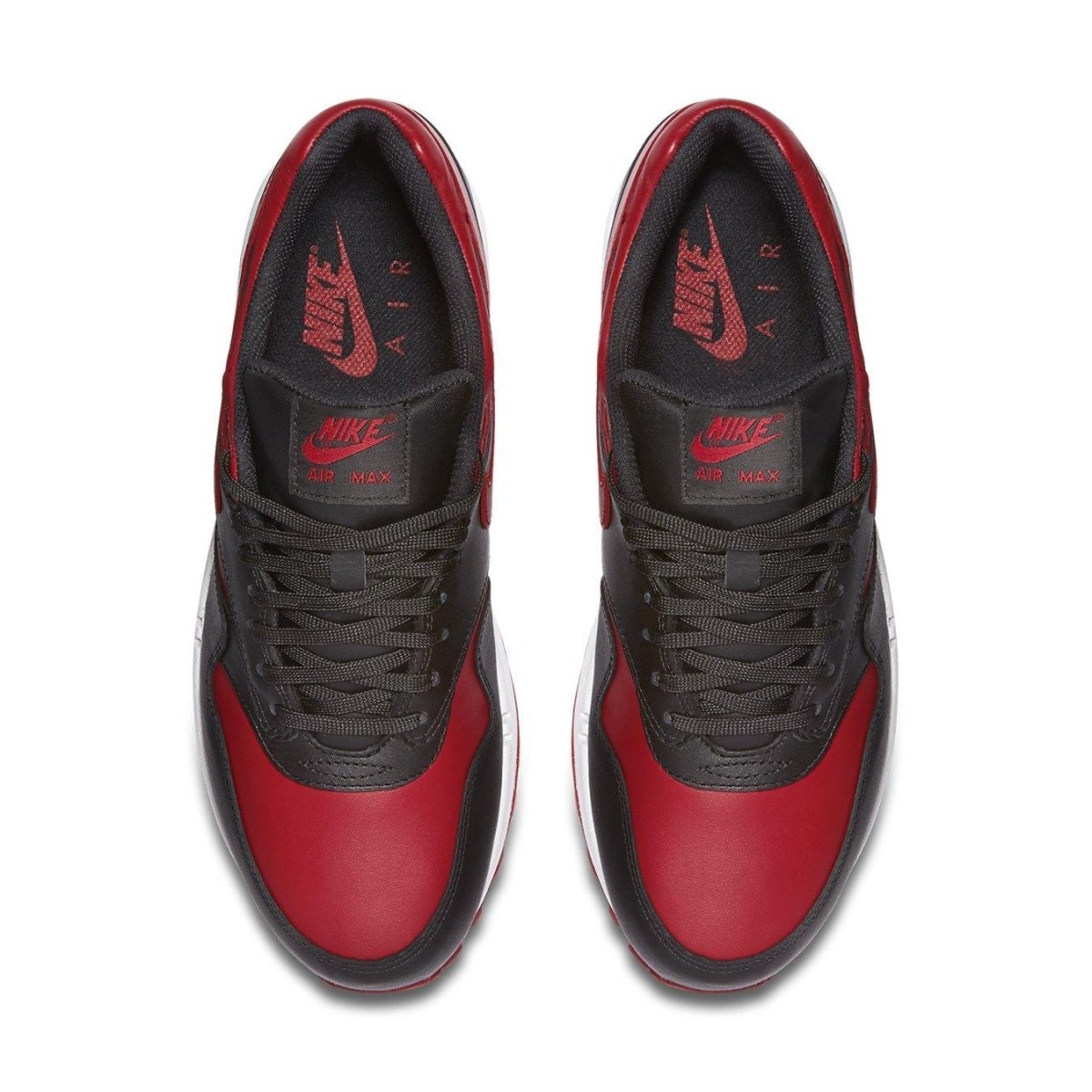 Top view of Nike Air Max 1 Bred sneaker in black and Varsity Red with brand logo.