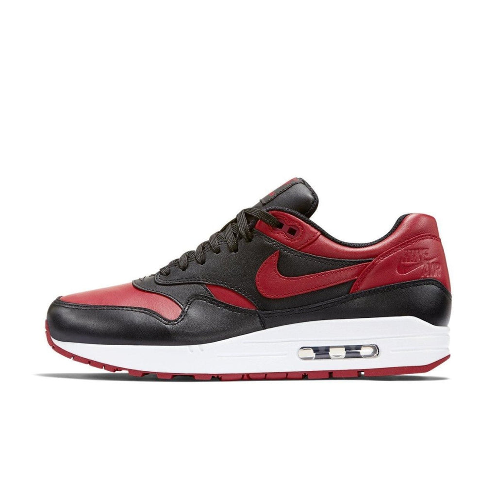Nike Air Max 1 Bred sneaker featuring a premium leather upper in Varsity Red and black.