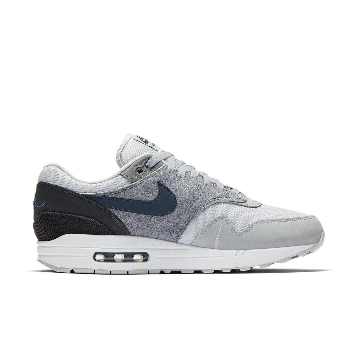 Nike Air Max 1 London in grey suede and mesh, inspired by London's urban landscape.