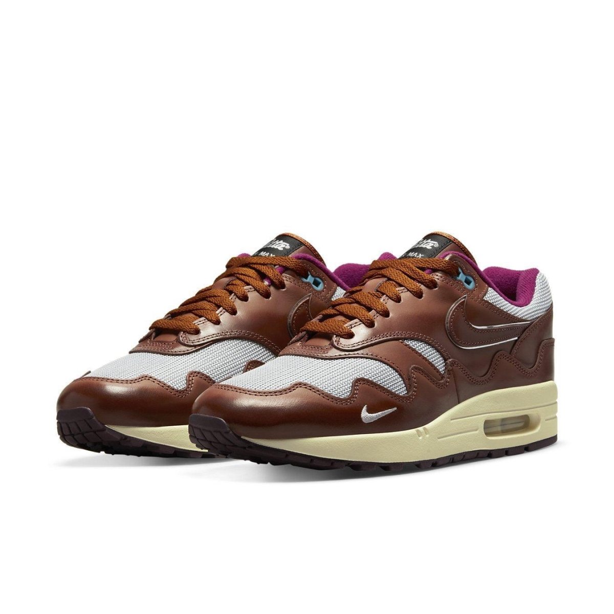 Nike Air Max 1 Patta The Next Wave in Dark Russett, featuring brown leather and a metallic silver design.