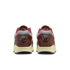 Nike Air Max 1 Patta The Next Wave in Dark Russett, featuring brown and metallic silver design with maroon accents.