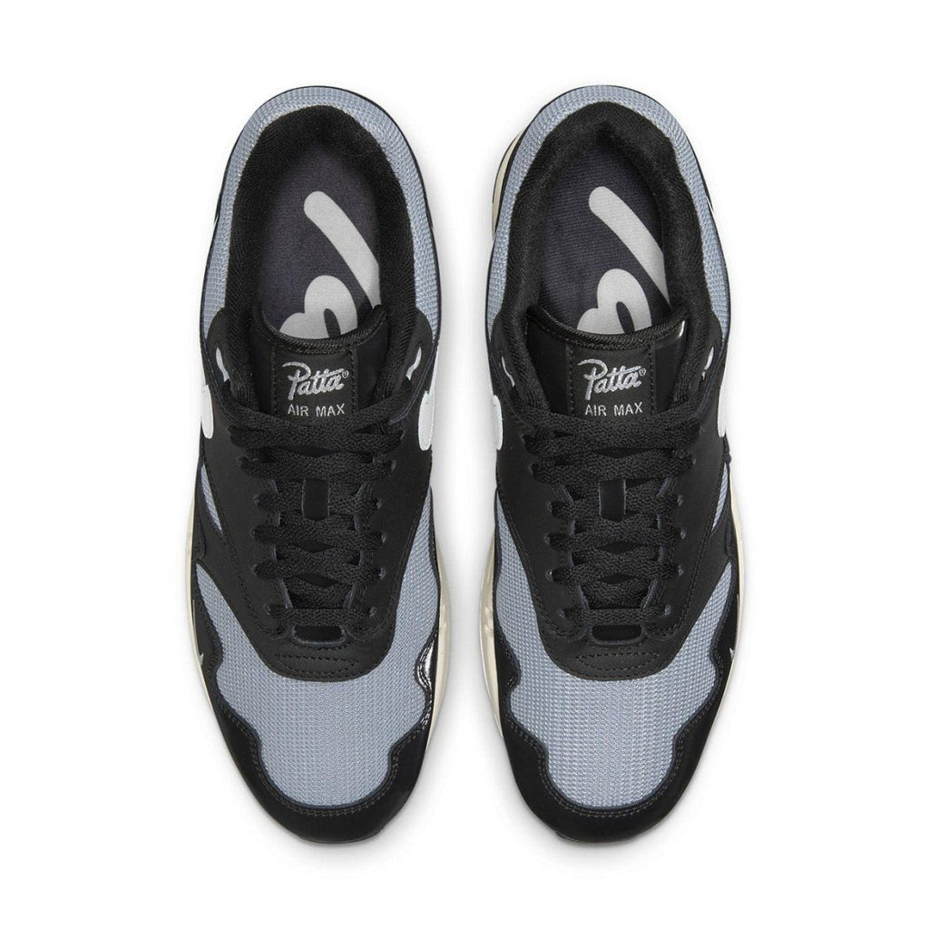Nike Air Max 1 Patta Waves Black top view showcasing mesh and synthetic leather design.