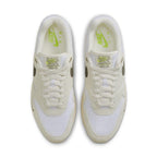 Nike Air Max 1 Sail Ironstone top view with white mesh and green accents, showcasing classic sneaker design.