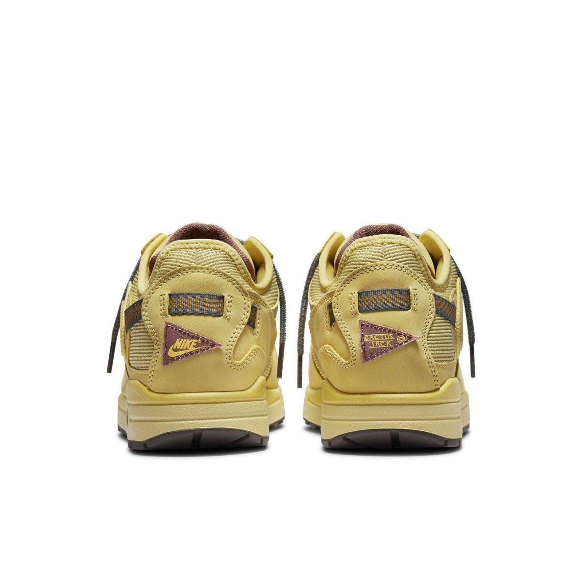 Rear view of Nike Air Max 1 Travis Scott 'Saturn Gold' with unique outdoor-inspired design elements.