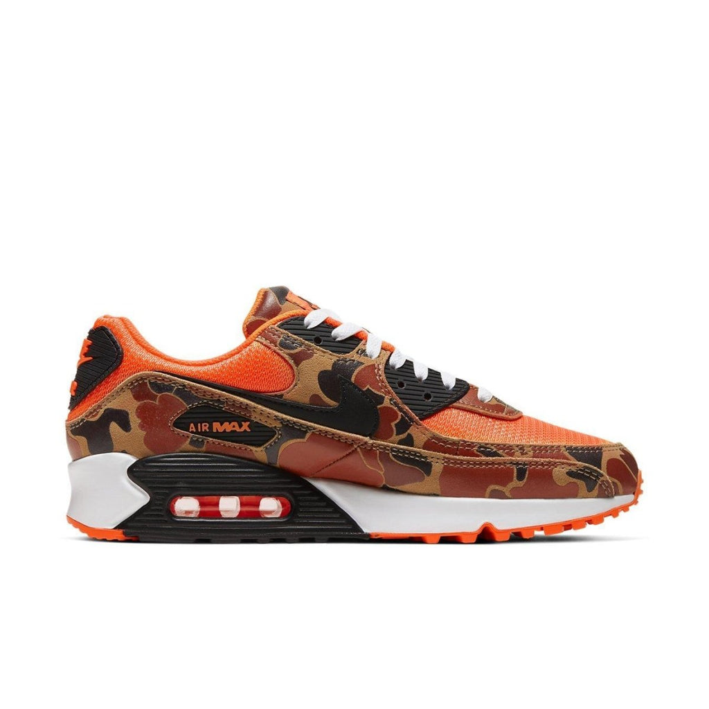 Nike Air Max 90 Duck Camo in Total Orange with black accents, showcasing a stylish camouflage design.