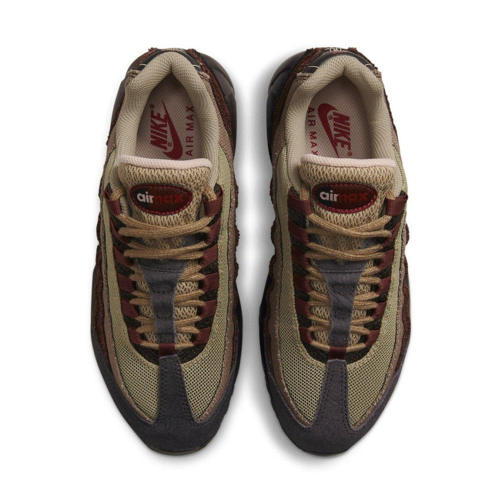 Top view of Nike Air Max 95 Anatomy of Air sneakers for women in earthy tones with intricate detailing.