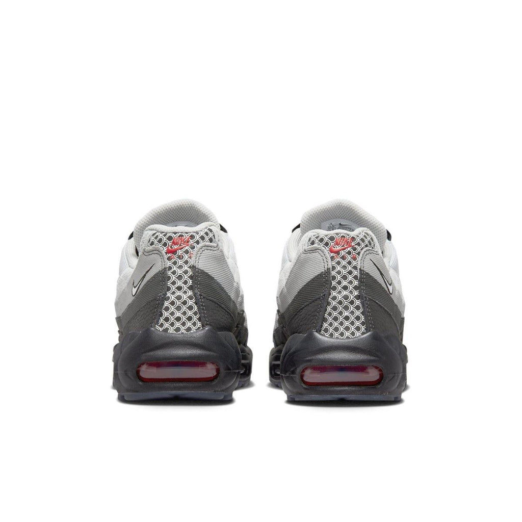 Nike Air Max 95 Fish Scales in gray and black with 3M reflective details and red accents, showing the rear view.