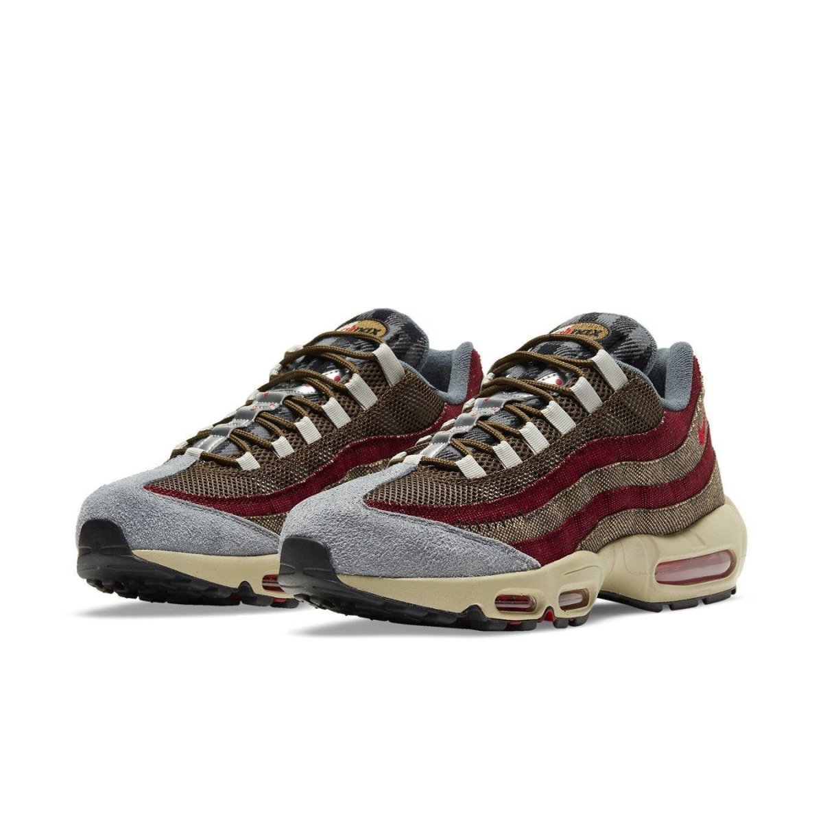 Nike Air Max 95 Freddy Krueger sneakers with red and brown tones inspired by Halloween.