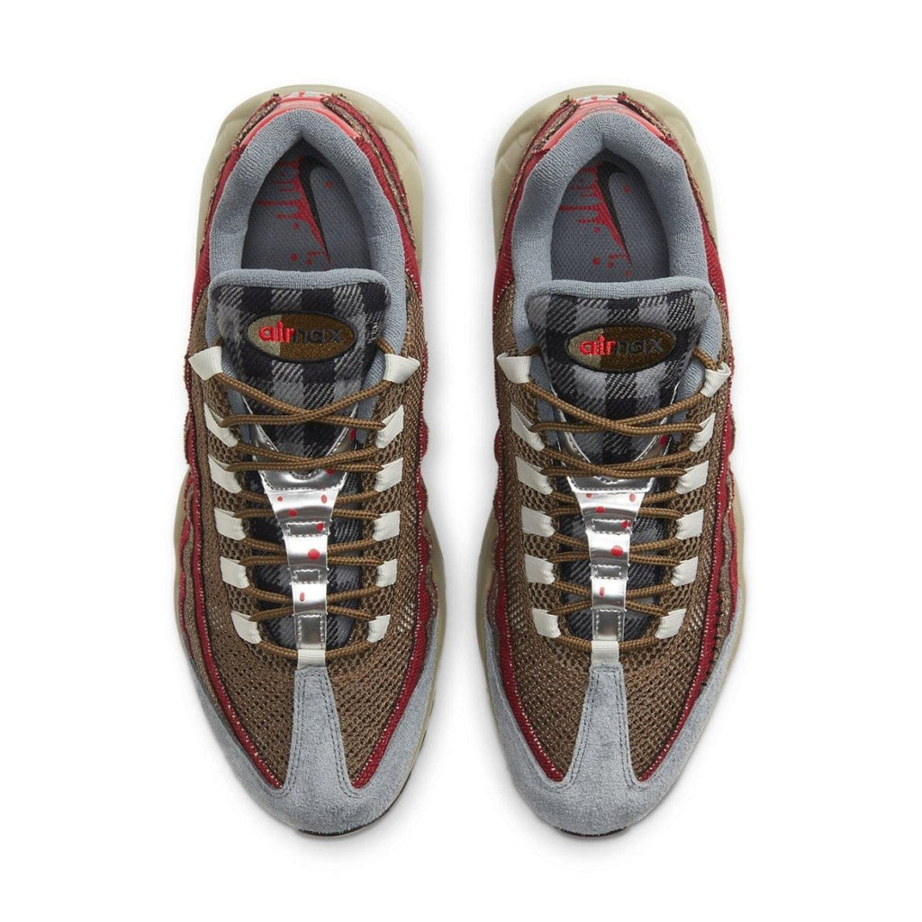 Nike Air Max 95 Freddy Krueger sneakers featuring red and brown Halloween-themed design.