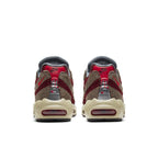 Nike Air Max 95 Freddy Krueger sneakers, featuring red and brown striped design inspired by Halloween.