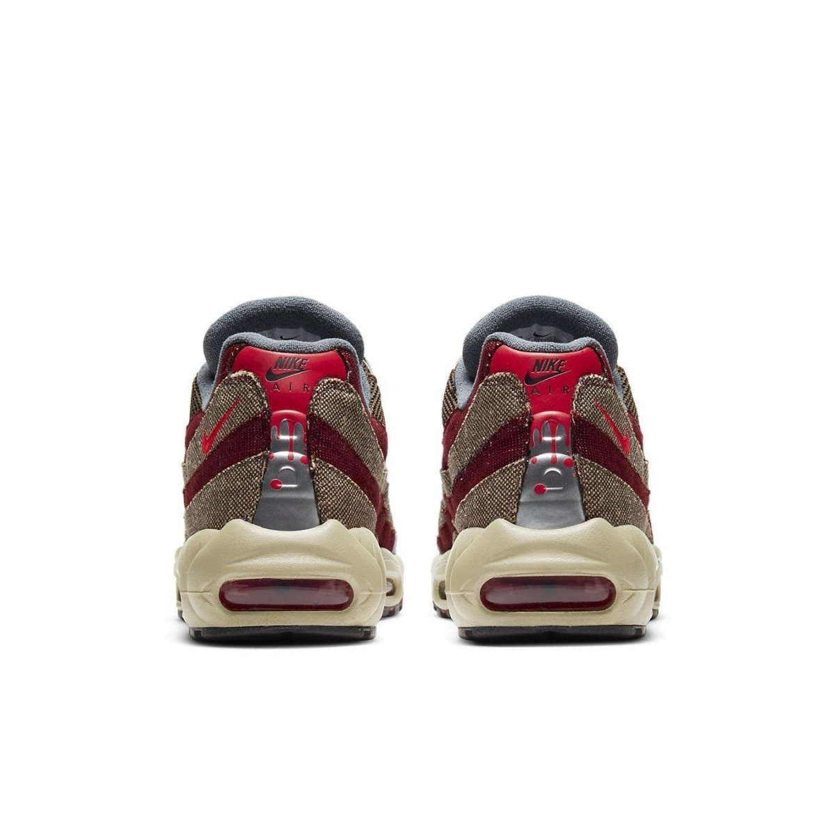 Nike Air Max 95 Freddy Krueger sneakers, featuring red and brown striped design inspired by Halloween.