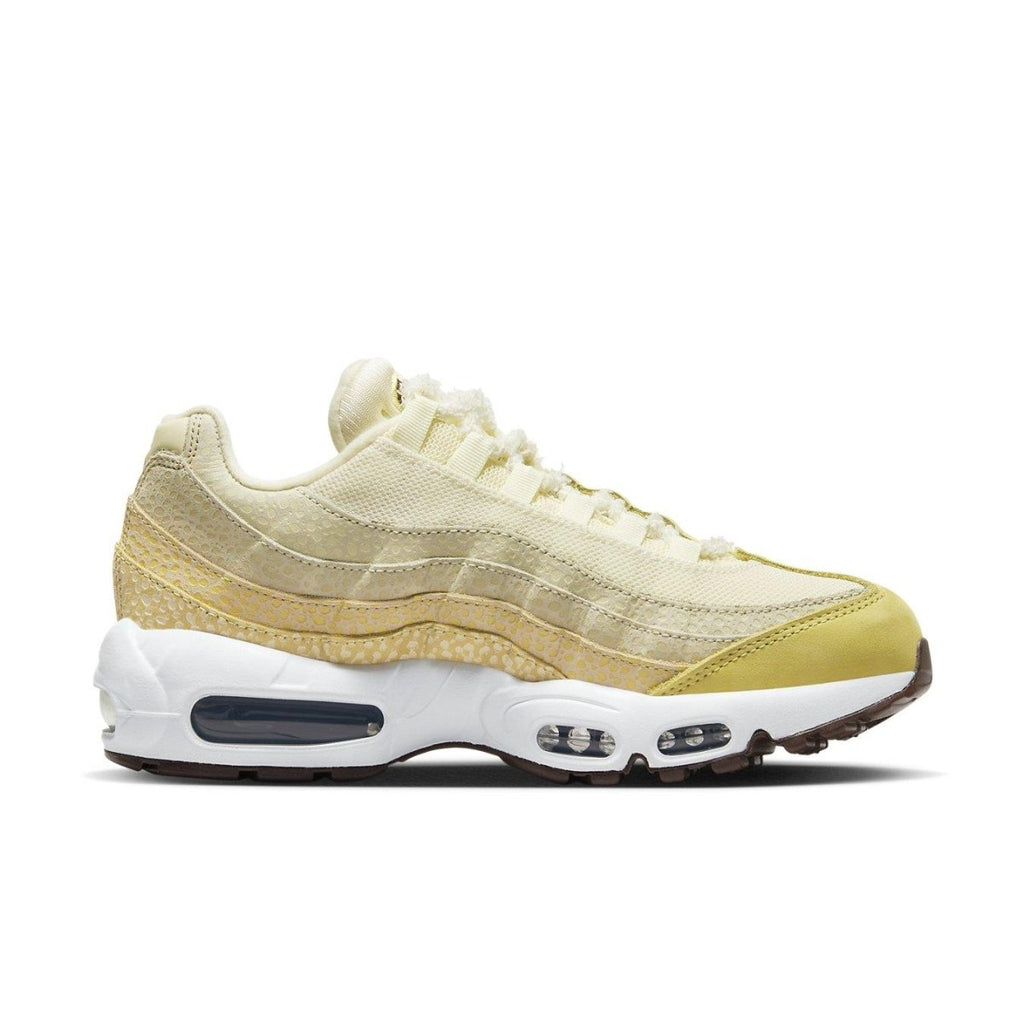 Nike Air Max 95 Saturn Gold Alabaster women's sneakers, featuring a stylish yellow and white design, perfect for casual wear.