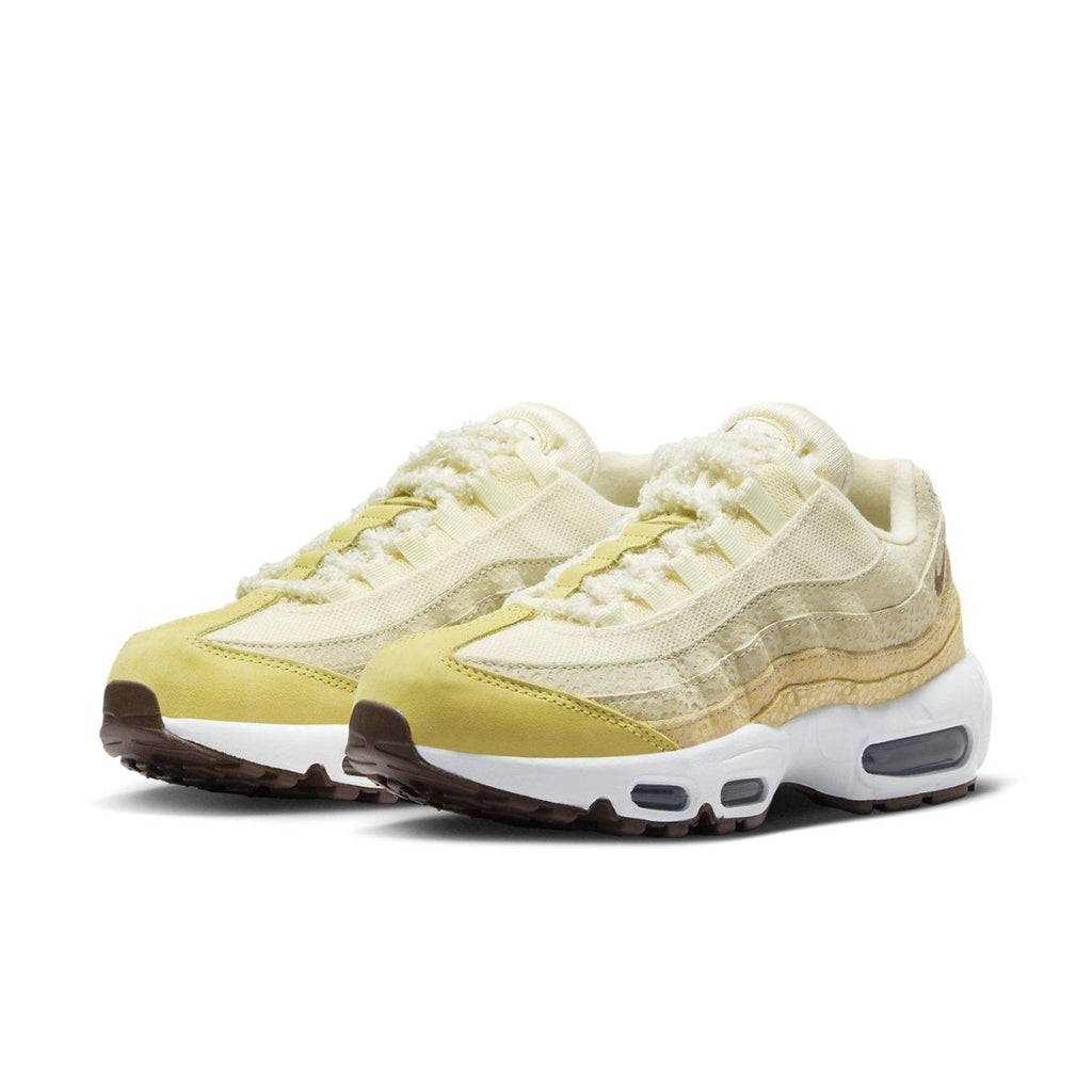 Nike Air Max 95 Saturn Gold Alabaster women's sneakers showcasing cream and gold colorway with a stylish design.
