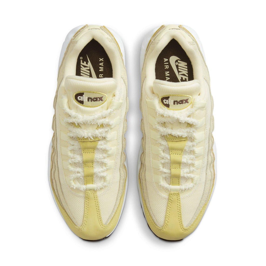Nike Air Max 95 Saturn Gold Alabaster shoes for women, featuring a stylish yellow and cream design.