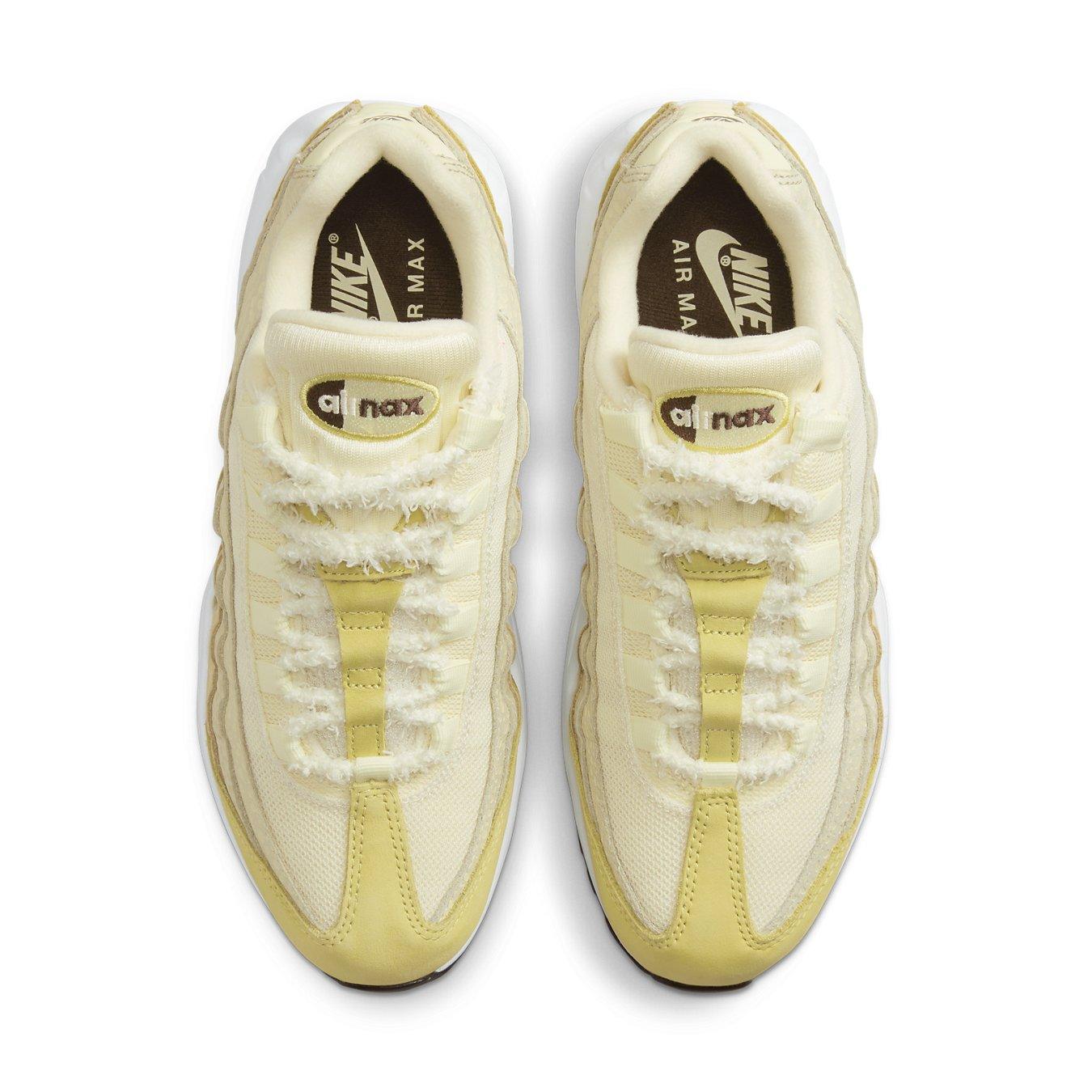 Nike Air Max 95 Saturn Gold Alabaster shoes for women, featuring a stylish yellow and cream design.