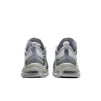Rear view of Nike Air Max 97 Off-White Menta sneakers in grey with iridescent Swoosh and unique detailing.