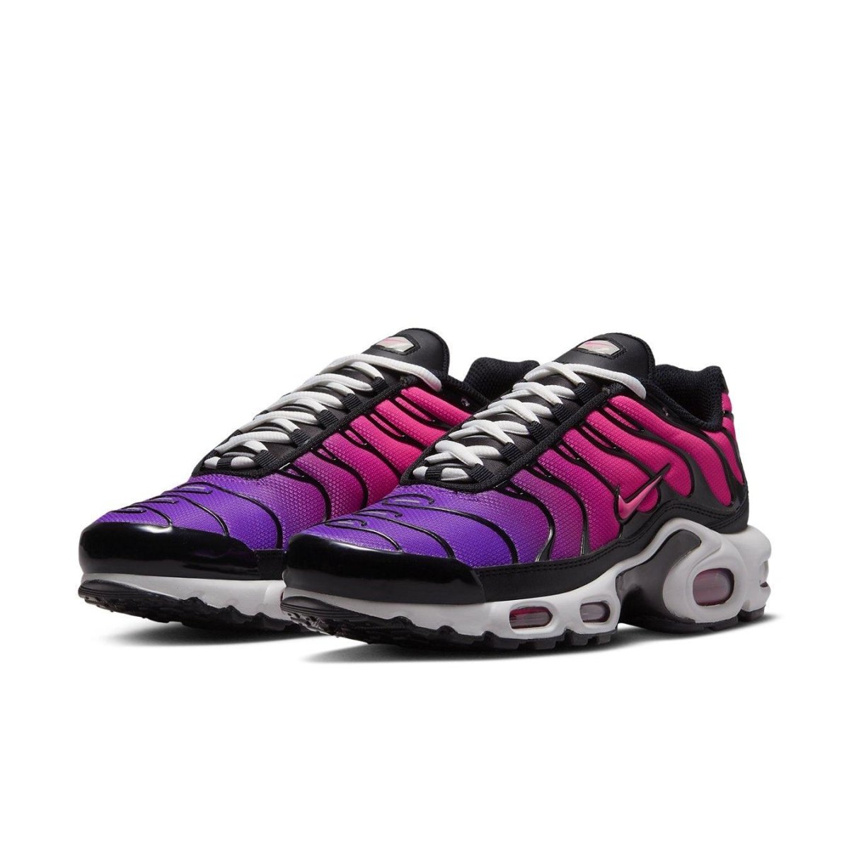 Nike Air Max Plus Dusk (W) in purple to pink gradient with black overlays and white laces.