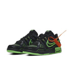 Nike Air Rubber Dunk Off-White Green Strike sneaker with black and green detailing and orange tag.