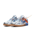 Nike Air Rubber Dunk Off-White UNC sneakers featuring a unique design with blue accents and distinctive lacing details.
