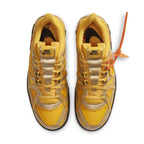 Nike Air Rubber Dunk Off-White University Gold sneakers in vibrant yellow with distinctive design and Off-White branding.