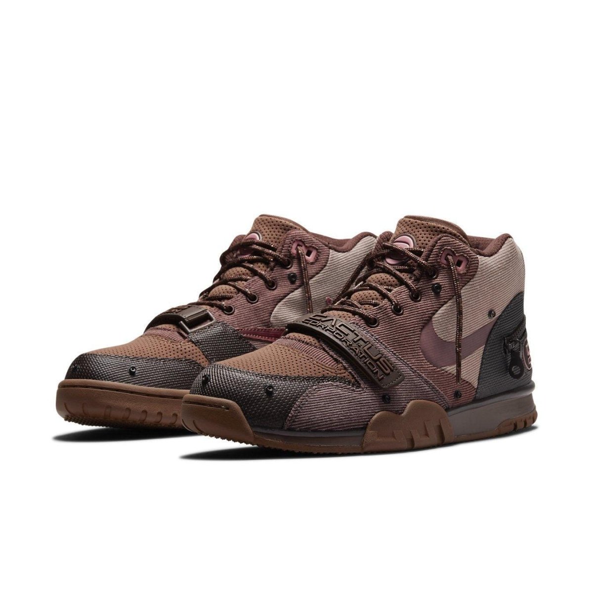 Nike Air Trainer 1 SP Travis Scott 'Wheat' sneaker in brown and gray with unique Swoosh design.