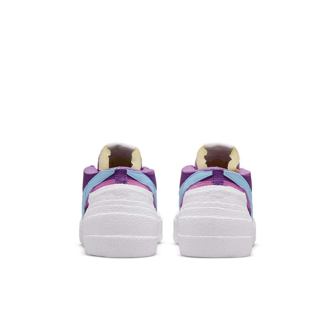 Nike Blazer Low sacai KAWS in Purple Dusk, featuring unique color design and stylish silhouette from the back view.