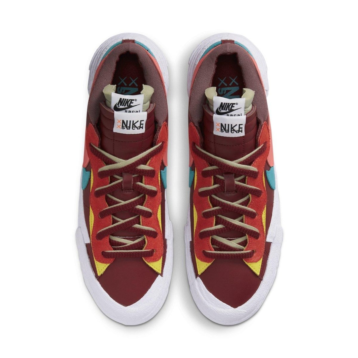 Nike Blazer Low Sacai KAWS in red with contrasting colors and dual laces, showcasing a unique design collaboration.