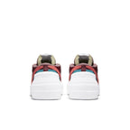 Back view of Nike Blazer Low sacai KAWS Red sneakers featuring dark red leather and contrasting color detailing.