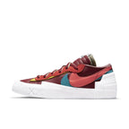 Nike Blazer Low sacai KAWS Red sneaker in dark red leather with contrasting accents and double laces.