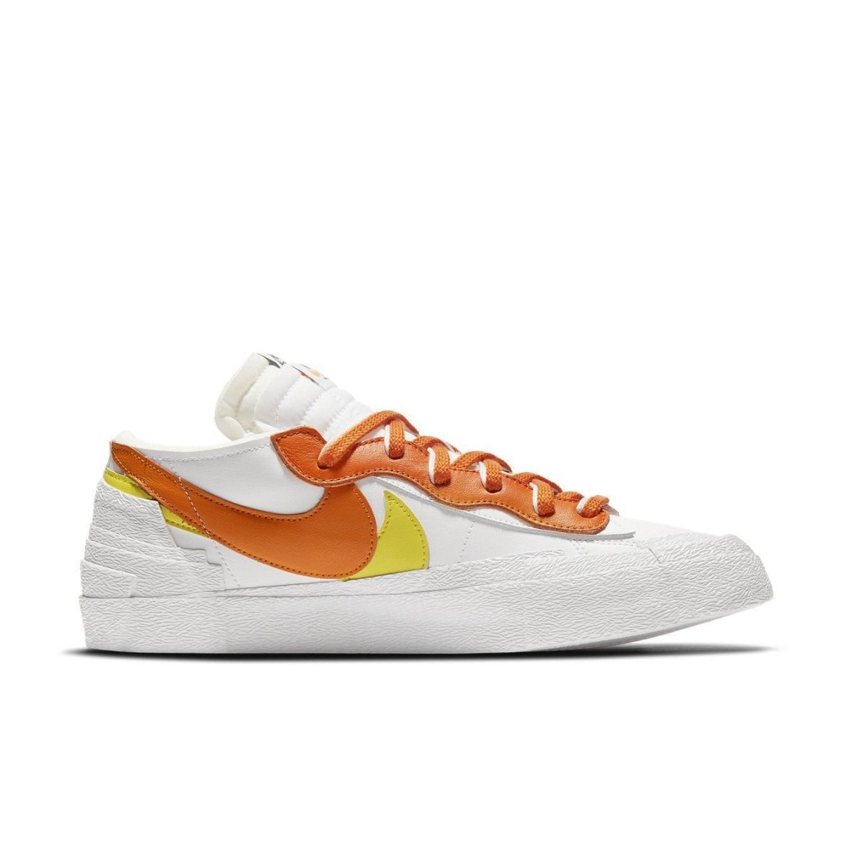 Nike Blazer Low sacai in White and Magma Orange with layered Swooshes and double laces, perfect for casual wear.