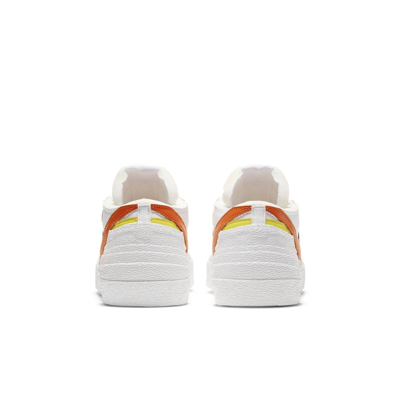 Nike Blazer Low sacai White Magma Orange rear view showcasing the distinctive overlapping Swoosh design.
