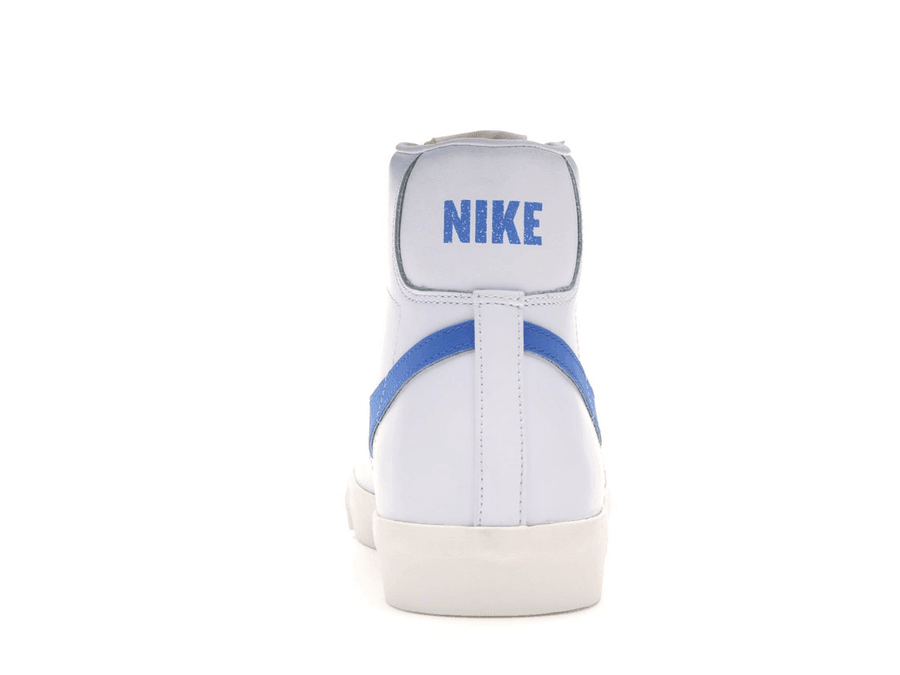 Nike Blazer Mid 77 Pacific Blue sneaker in Sail White with blue accents and prominent Swoosh.