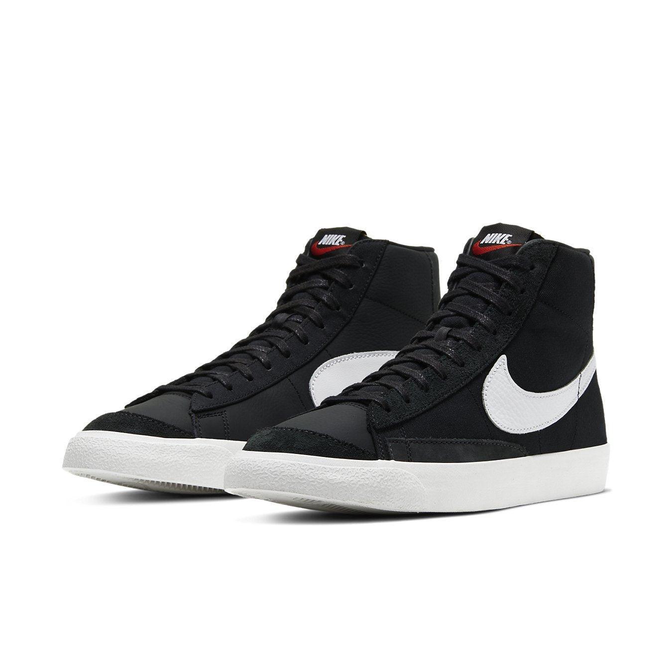 Nike Blazer Mid 77 Vintage Slam Jam Class 1977 in black and white with inverted Swoosh design.