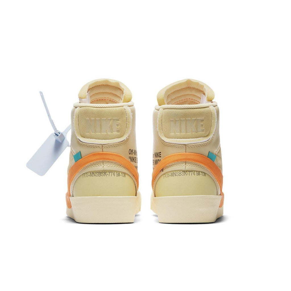 Rear view of Nike Blazer Mid Off-White All Hallow's Eve sneakers showcasing orange accents and distinctive branding.