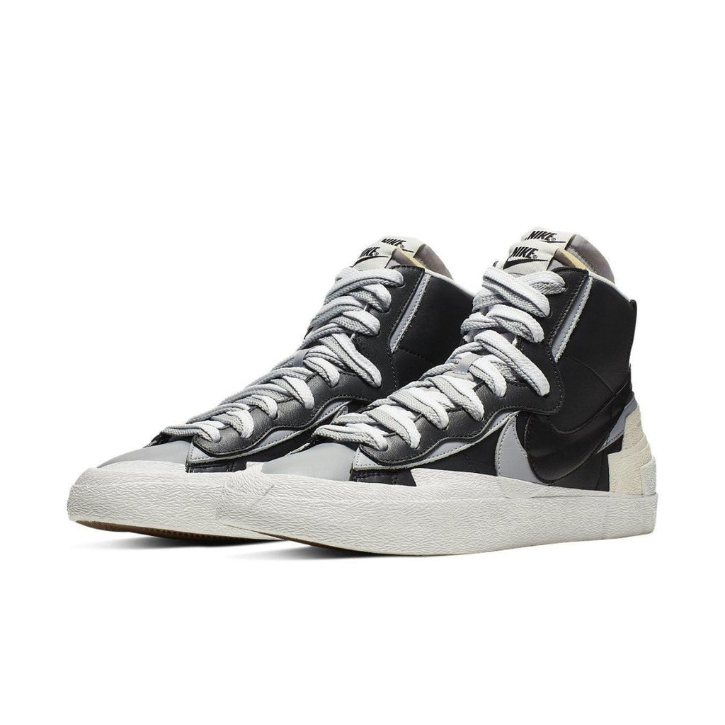 Nike Blazer Mid sacai Black Grey sneakers featuring a deconstructed design in elegant black and grey colorway.