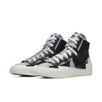 Nike Blazer Mid sacai Black Grey sneakers featuring a deconstructed design in elegant black and grey colorway.