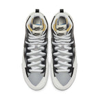 Nike Blazer Mid sacai Black Grey sneakers with black, grey, and white colorway, showcasing unique design elements.