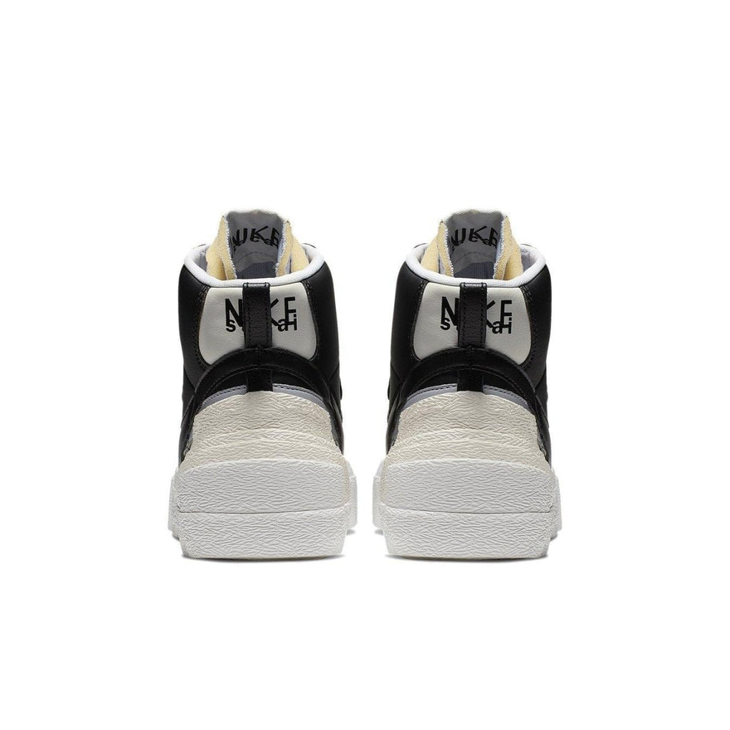 Nike Blazer Mid sacai Black Grey sneaker rear view showcasing stylish design and color contrast.