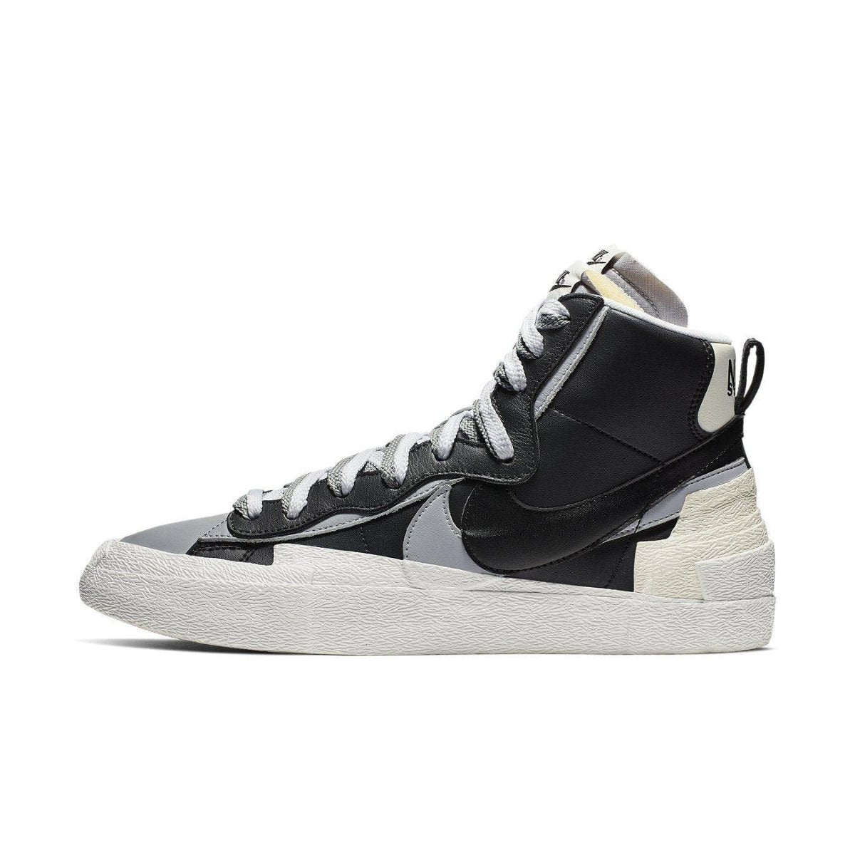Nike Blazer Mid sacai in black, grey, and white, featuring a deconstructed design for autumn and winter wear.