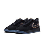 Nike Book 1 Haven sneakers in black suede with bronze Swoosh and blue sole, inspired by Devin Booker's dog.