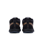 Rear view of Nike Book 1 Haven sneakers featuring black suede and bronze Swoosh, emphasizing 'Chapter One' branding.